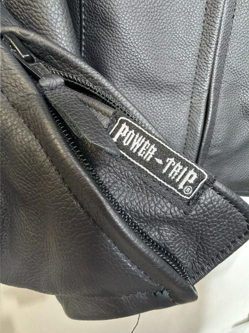 Black Leather Rider Jacket with Red Patch Details